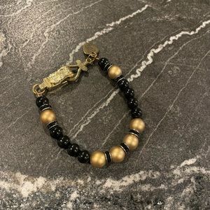 Black and gold beaded bracelets with gold latch